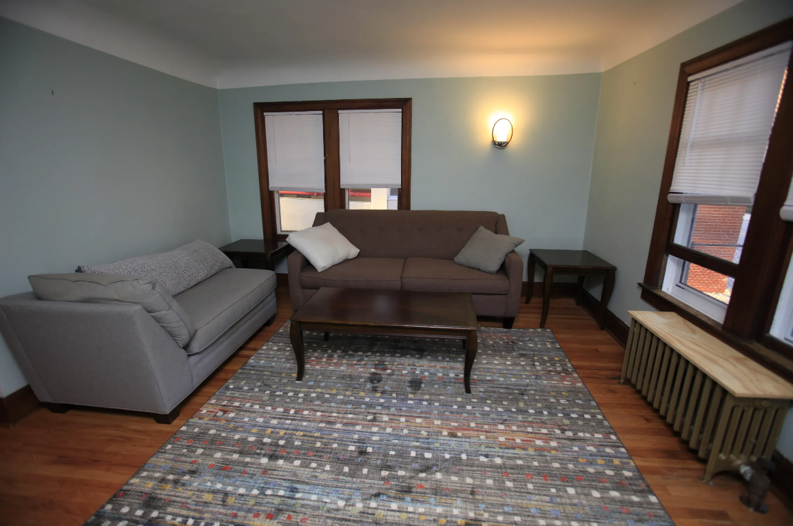 a living room with a couch and a coffee table